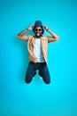 Full length of playful young African man Royalty Free Stock Photo