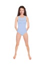 Full length portrait of an attractive cheerful woman wearing a blue bathing suit Royalty Free Stock Photo