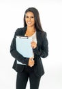 Full length portrait of Attractive latin corporate latin woman looking excited and holding folder and paperwork in Creative Royalty Free Stock Photo