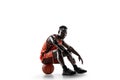 Full length portrait of a basketball player with ball Royalty Free Stock Photo