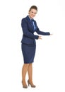 Full length portrait of business woman inviting Royalty Free Stock Photo