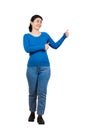 Full length portrait of casual young woman walking to camera smiling and showing thumbs up, like positive feedback gesture, Royalty Free Stock Photo