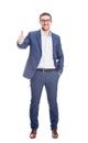 Full length portrait, cheerful businessman smiling broadly showing thumb up gesture isolated on white background. Contented Royalty Free Stock Photo