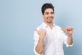 Full length portrait of a cheerful handsome young man Royalty Free Stock Photo