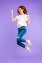 Full length portrait of a cheerful young girl Royalty Free Stock Photo