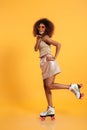 Full length portrait of a cheery afro american woman Royalty Free Stock Photo