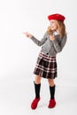 Full length portrait of a cheery little schoolgirl Royalty Free Stock Photo