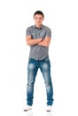 Full length portrait of a confident young man with arms crossed Royalty Free Stock Photo