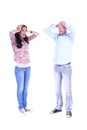 Full length portrait of couple.Desperate man hands clasped. Over white Royalty Free Stock Photo