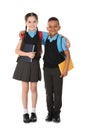 Full length portrait of cute children in school uniform with books on white Royalty Free Stock Photo