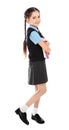 Full length portrait of cute girl in school uniform with books