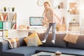 Funny Girl Jumping on Sofa Royalty Free Stock Photo