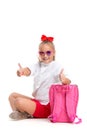 Full length portrait of cute little kid in stylish sunglasses looking at camera and smiling Royalty Free Stock Photo