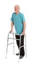 Full length portrait of elderly man using walking frame Royalty Free Stock Photo