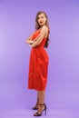 Full length portrait of elegant brunette woman 20s wearing red d Royalty Free Stock Photo