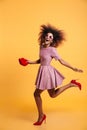 Full length portrait of an excited cheery afro american woman Royalty Free Stock Photo