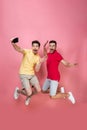 Full length portrait of an excited gay male couple Royalty Free Stock Photo