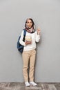 Full length portrait of an excited young arabian woman Royalty Free Stock Photo