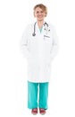 Full length portrait of experienced female doctor