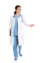 Full length portrait of female doctor with clipboard isolated on white Royalty Free Stock Photo