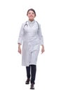 Full length portrait of female doctor walking towards the camera smiling Royalty Free Stock Photo