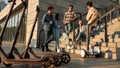 Make friends. A group of millennials with kick scooters and segways on a sunny day