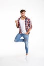 Full length portrait of a funny casual man jumping Royalty Free Stock Photo