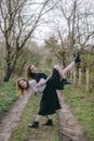 Full length portrait, the girl holds another girl on her back, Having fun together, positive emotions, bright colors. two Royalty Free Stock Photo