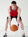 Wanna ball. Full length portrait of a handsome young male basketball player posing in studio.