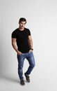 Full length  of handsome young man in casual clothes on grey background Royalty Free Stock Photo