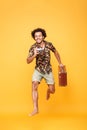 Full length portrait of a happy african man in summer clothes Royalty Free Stock Photo