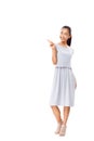 Full length portrait of happy Asian woman pointing finger isolated Royalty Free Stock Photo