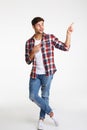 Full length portrait of a happy excited man pointing Royalty Free Stock Photo