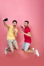 Full length portrait of a happy gay male couple Royalty Free Stock Photo