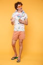 Full length portrait of a happy man in summer clothes Royalty Free Stock Photo