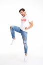 Full length portrait of a happy man in volunteer t-shirt