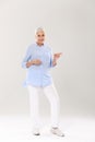 Full-length portrait of happy senior gray-haired woman, standin Royalty Free Stock Photo