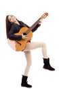 Full length portrait of happy teenage girl playing guitar Royalty Free Stock Photo