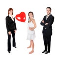 Full length portrait of a happy young family of three Royalty Free Stock Photo