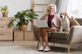 Happy Senior Woman with Loving Pet Royalty Free Stock Photo