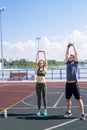 Young Couple Warming Up Outdoors