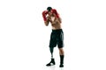 Full length portrait of muscular sportsman with prosthetic leg, copy space. Male boxer in red gloves. Royalty Free Stock Photo