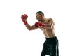 Full length portrait of muscular sportsman with prosthetic leg, copy space. Male boxer in red gloves. Royalty Free Stock Photo