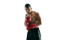 Full length portrait of muscular sportsman with prosthetic leg, copy space. Male boxer in red gloves. Royalty Free Stock Photo