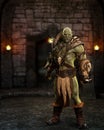 Full length portrait of an Orc fantasy creature standing in aggresive pose in a dark dungeon with torch flames on the wall in the Royalty Free Stock Photo