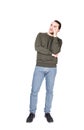 Full length portrait pensive young man, keeps fingers to temple, thoughtful gesture, isolated on white background with copy space