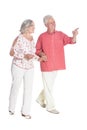 Full length portrait of senior couple holding hands isolated Royalty Free Stock Photo