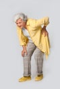 Full length portrait of senior woman having knee problems o Royalty Free Stock Photo