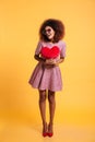 Full length portrait of a smiling happy afro american woman Royalty Free Stock Photo