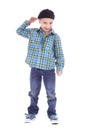 Full length portrait of smiling little boy in jeans Royalty Free Stock Photo